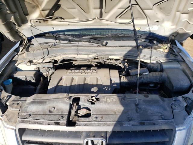Photo 12 from auction – 2005 HONDA PILOT with VIN 2HKYF18665H530791