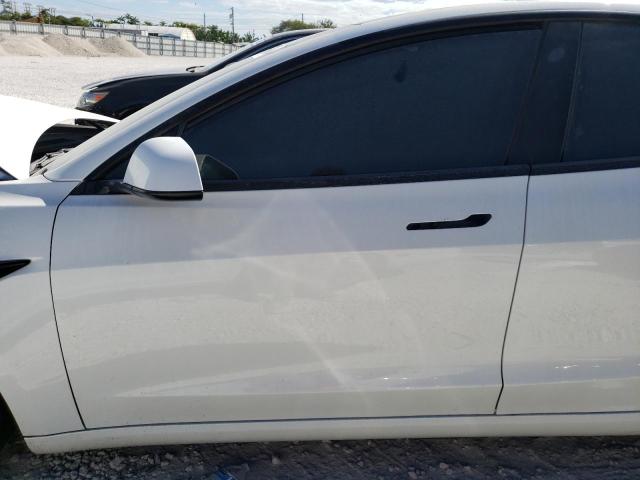 Photo 7 from auction – 2021 TESLA MODEL 3 with VIN 5YJ3E1EA8MF097526