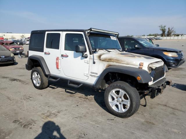 Photo 4 from auction – 2011 JEEP WRANGLER U with VIN 1J4BA3H12BL639822