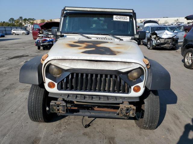 Photo 5 from auction – 2011 JEEP WRANGLER U with VIN 1J4BA3H12BL639822