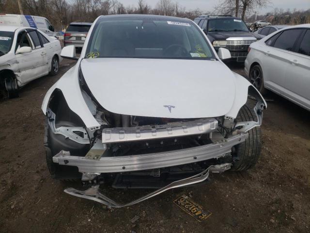Photo 5 from auction – 2022 TESLA MODEL Y with VIN 7SAYGDEE5NF385688