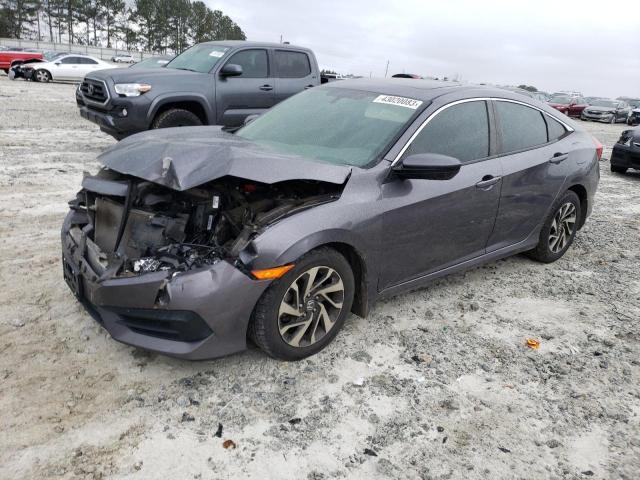 HONDA CIVIC EX 2016 with VIN 19XFC2F7XGE002700 - Photo from auction