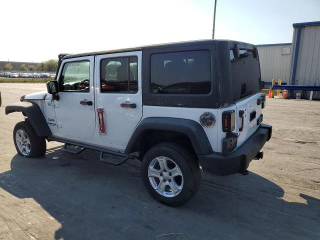 Photo 2 from auction – 2011 JEEP WRANGLER U with VIN 1J4BA3H12BL639822