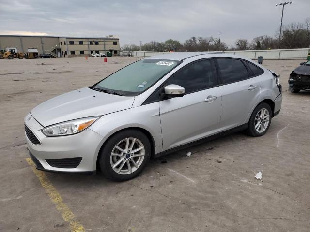 FORD FOCUS SE 2017 with VIN 1FADP3F2XHL210175 - Photo from auction