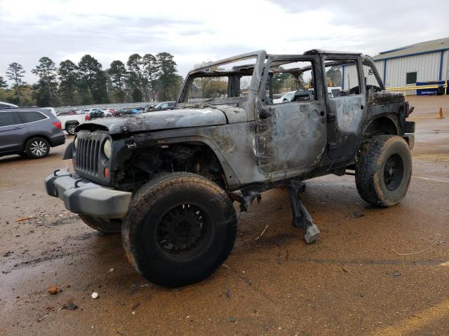 JEEP WRANGLER U 2011 with VIN 1J4HA3H17BL589722 - Photo from auction