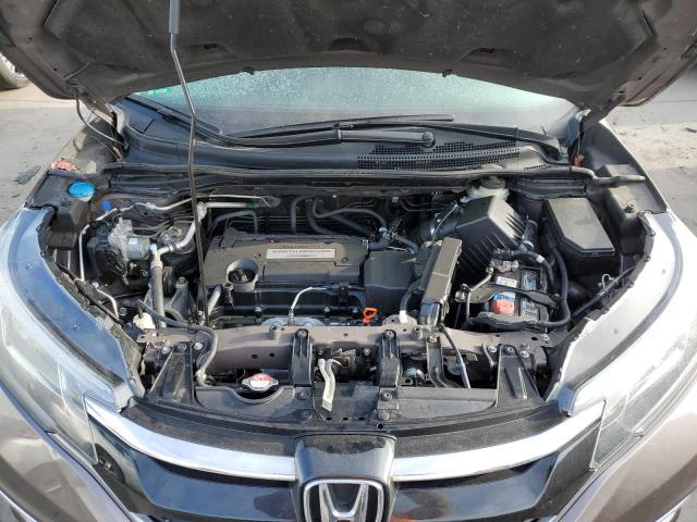 Photo 12 from auction – 2015 HONDA CR-V EX with VIN 2HKRM4H52FH650219
