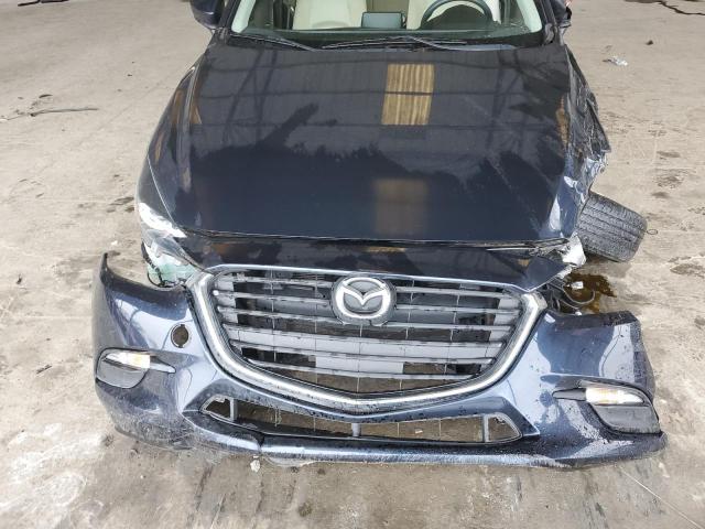 Photo 11 from auction – 2018 MAZDA 3 SPORT with VIN 3MZBN1U76JM226515