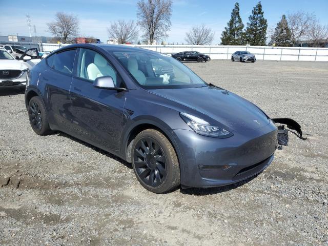 Photo 4 from auction – 2022 TESLA MODEL Y with VIN 7SAYGDEE7NF355690