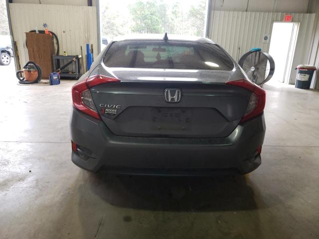 Photo 6 from auction – 2018 HONDA CIVIC EX with VIN 19XFC2F73JE013495