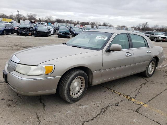 LINCOLN TOWN CAR E 2001 with VIN 1LNHM81W91Y710828 - Photo from auction
