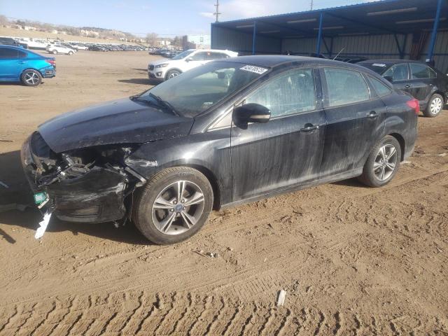 FORD FOCUS SE 2017 with VIN 1FADP3FEXHL290328 - Photo from auction