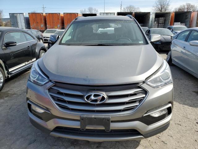 Photo 5 from auction – 2017 HYUNDAI SANTA FE S with VIN 5NMZU3LB1HH050251