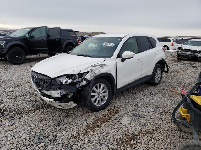 MAZDA CX-5 SPORT 2014 with VIN JM3KE2BE7E0355891 - Photo from auction