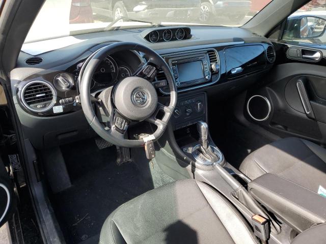 Photo 8 from auction – 2014 VOLKSWAGEN BEETLE with VIN 3VWJL7AT5EM615142