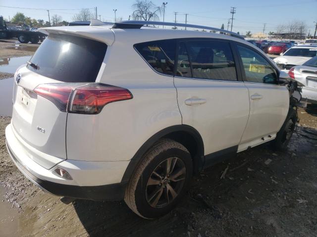 Photo 3 from auction – 2016 TOYOTA RAV4 XLE with VIN 2T3WFREV6GW289599