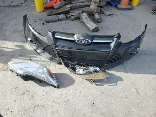 Photo 12 from auction – 2012 FORD FOCUS SE with VIN 1FAHP3F25CL411427