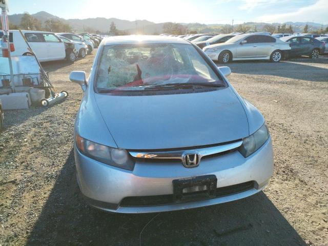 Photo 5 from auction – 2006 HONDA CIVIC EX with VIN JHMFA16876S006979