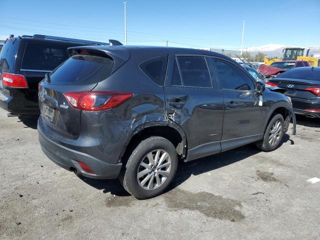 Photo 3 from auction – 2015 MAZDA CX-5 SPORT with VIN JM3KE2BE3F0495986