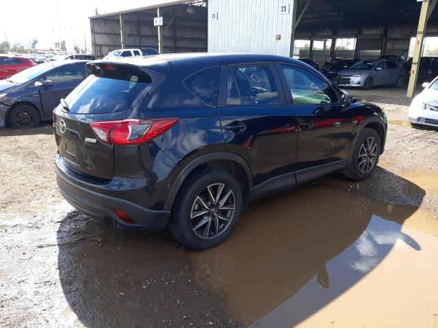 Photo 3 from auction – 2015 MAZDA CX-5 TOURI with VIN JM3KE2CY4F0431707