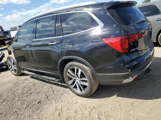 Photo 2 from auction – 2018 HONDA PILOT TOUR with VIN 5FNYF5H96JB020404