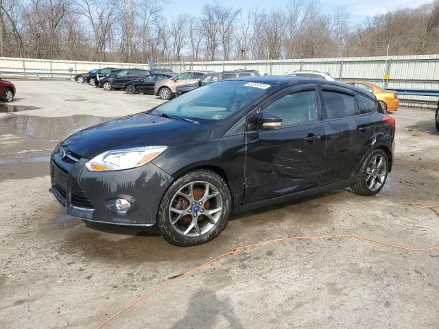 FORD FOCUS SE 2013 with VIN 1FADP3K27DL267661 - Photo from auction