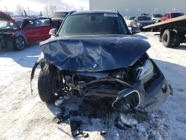 Photo 5 from auction – 2014 BMW X1 XDRIVE2 with VIN WBAVL1C54EVR93052