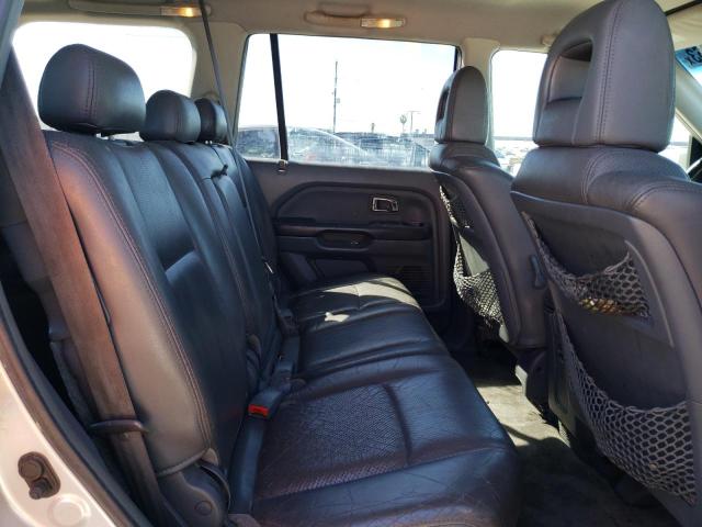 Photo 11 from auction – 2004 HONDA PILOT with VIN 2HKYF18574H609876