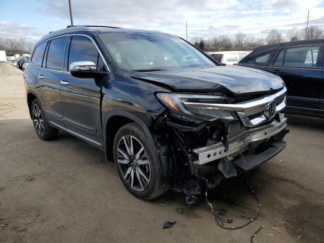 Photo 4 from auction – 2021 HONDA PILOT ELIT with VIN 5FNYF6H06MB058730