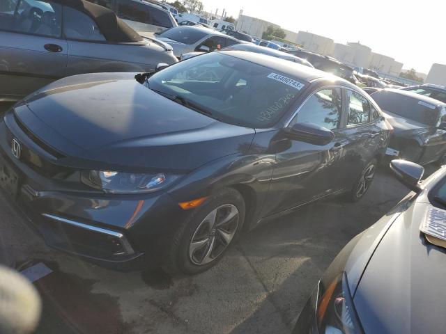 HONDA CIVIC LX 2019 z numerem VIN 19XFC2F69KE213905 - Zdjęcie z aukcji