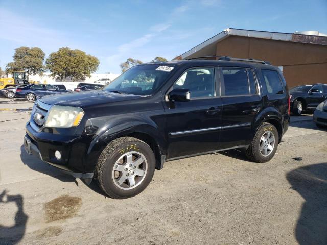 HONDA PILOT TOUR 2011 with VIN 5FNYF4H90BB039784 - Photo from auction