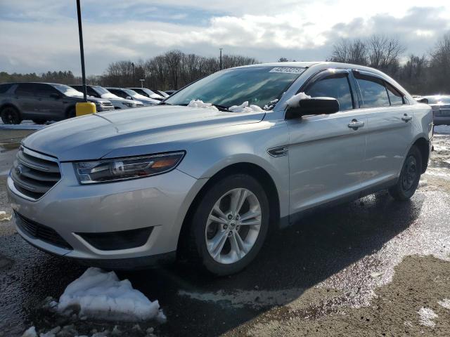 FORD TAURUS SE 2016 with VIN 1FAHP2D8XGG132829 - Photo from auction