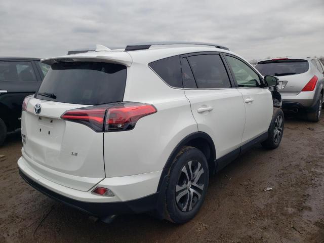 Photo 3 from auction – 2018 TOYOTA RAV4 LE with VIN JTMZFREV0JJ178811