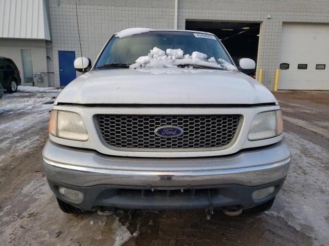 Photo 5 from auction – 2000 FORD F150 with VIN 1FTRX18L3YKA27166