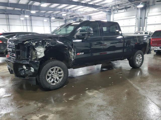 CHEVROLET SILVERADO 2018 with VIN 1GC1KWEY9JF167259 - Photo from auction