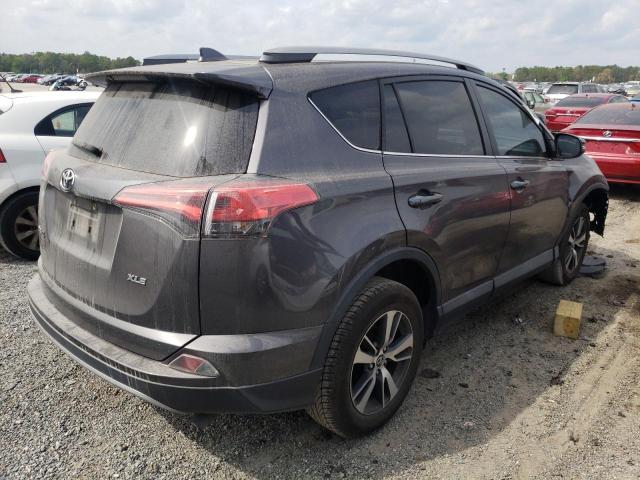 Photo 3 from auction – 2017 TOYOTA RAV4 XLE with VIN 2T3WFREVXHW396012
