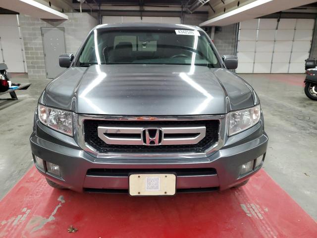 Photo 5 from auction – 2011 HONDA RIDGELINE with VIN 5FPYK1F54BB004067