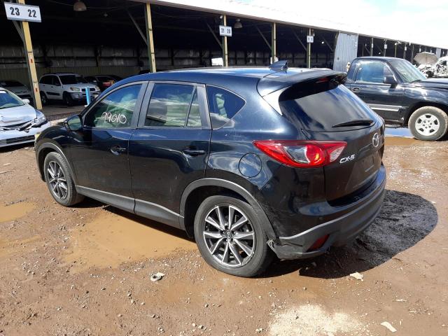 Photo 2 from auction – 2015 MAZDA CX-5 TOURI with VIN JM3KE2CY4F0431707