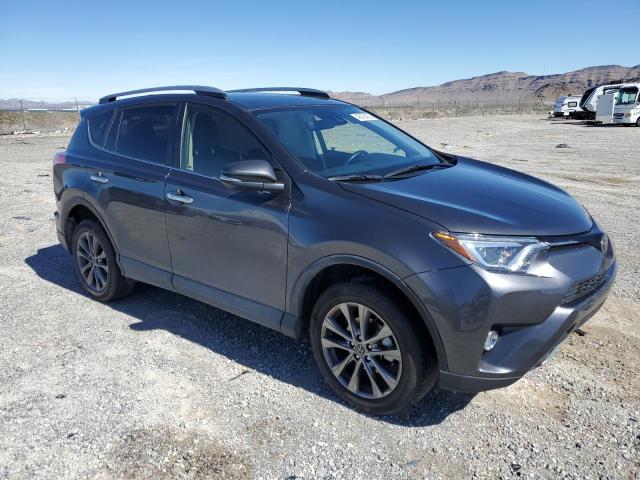 Photo 4 from auction – 2018 TOYOTA RAV4 LIMIT with VIN JTMDFREV3JJ259795