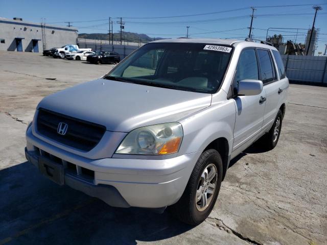 HONDA PILOT 2004 with VIN 2HKYF18574H609876 - Photo from auction
