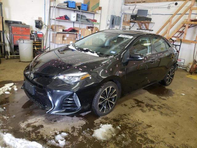 TOYOTA COROLLA L 2017 with VIN 5YFBURHE9HP580402 - Photo from auction