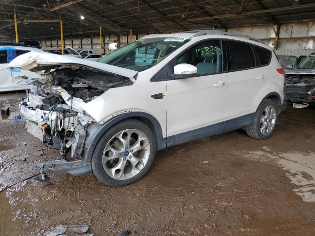 FORD ESCAPE TIT 2014 with VIN 1FMCU0J9XEUA13963 - Photo from auction