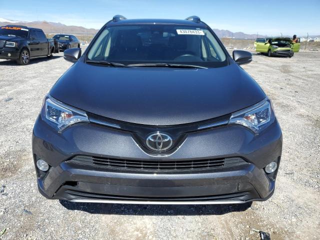 Photo 5 from auction – 2018 TOYOTA RAV4 LIMIT with VIN JTMDFREV3JJ259795