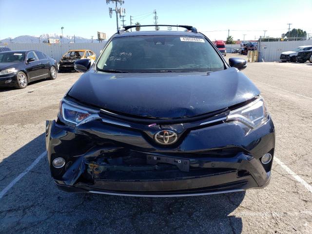 Photo 5 from auction – 2018 TOYOTA RAV4 LIMIT with VIN 2T3YFREV5JW409988