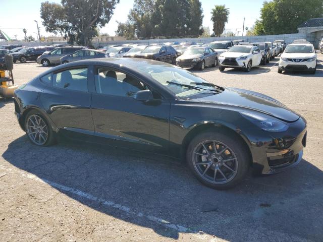 Photo 4 from auction – 2022 TESLA MODEL 3 with VIN 5YJ3E1EA0NF289251