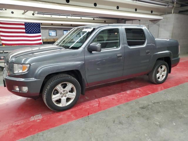 HONDA RIDGELINE 2011 with VIN 5FPYK1F54BB004067 - Photo from auction