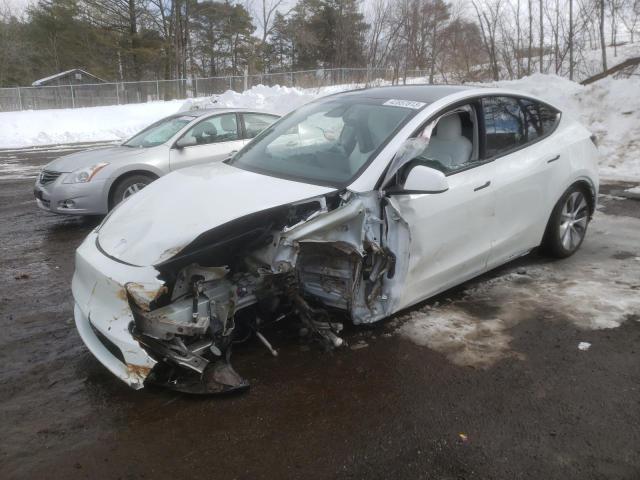 TESLA MODEL Y 2022 with VIN 7SAYGDEE2NF396292 - Photo from auction