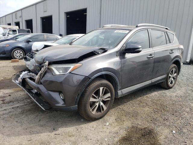 Photo 1 from auction – 2017 TOYOTA RAV4 XLE with VIN 2T3WFREVXHW396012