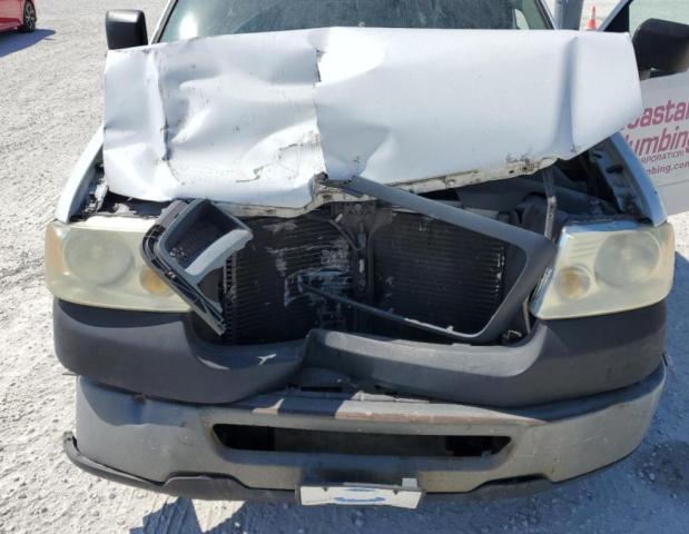 Фото 11 с аукциона – 2006 FORD F150 с VIN 1FTRF12296NB02533
