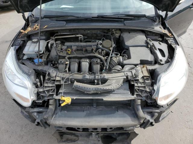 Photo 11 from auction – 2013 FORD FOCUS SE with VIN 1FADP3F23DL272138