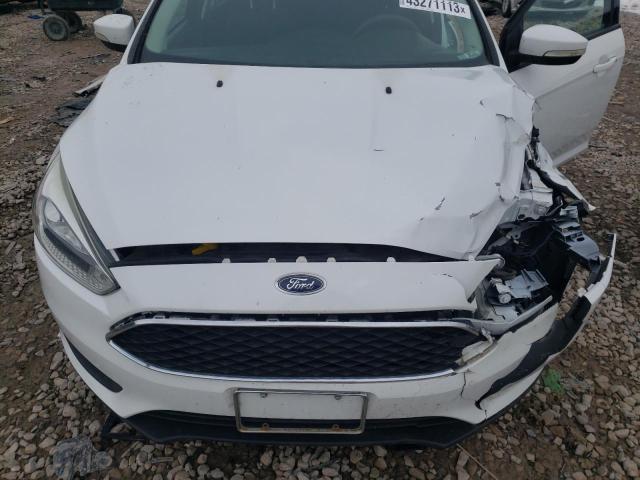 Photo 11 from auction – 2015 FORD FOCUS SE with VIN 1FADP3F22FL256807